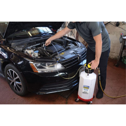 &eacute;vacuateur/distributeur de fluide M & M Nord Ouest Inc